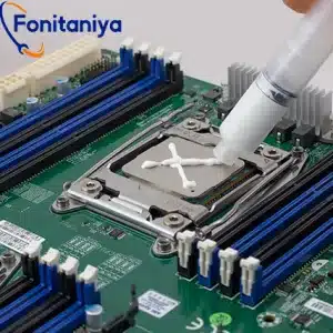 Close-up of a CPU with thermal grease evenly applied on a modern motherboard, showcasing its smooth texture and proper application.
