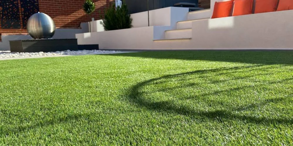 a well-preserve artificial grass under the sunlight