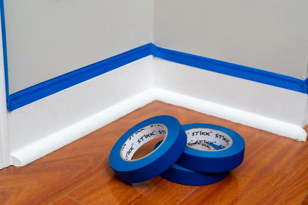 2 rolls of painter's tapes at the corner