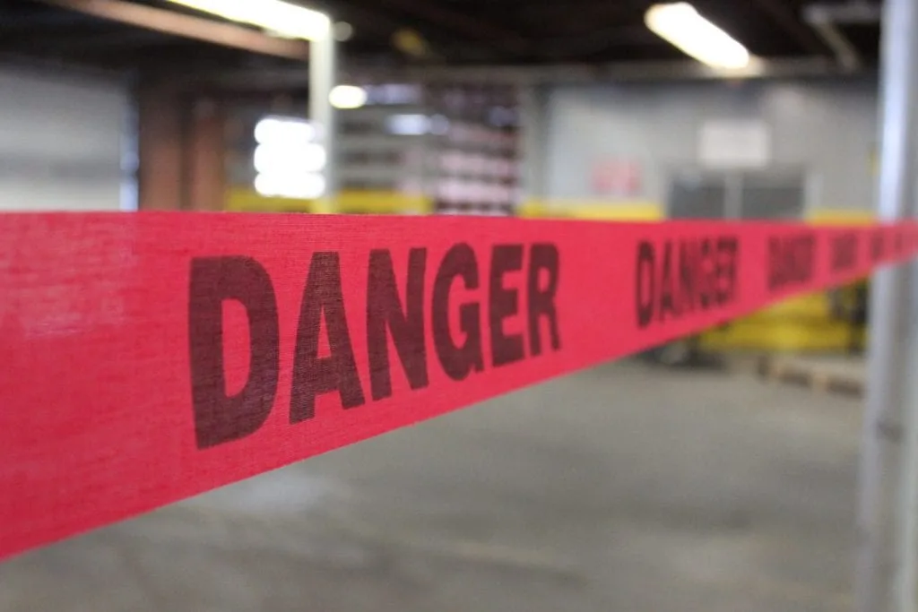 a scene block by a red barricade tape, whic is repulpable