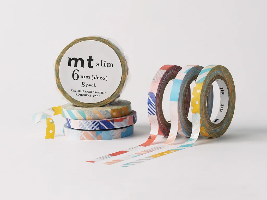 several rolls of washi paper tape in colours for decoration