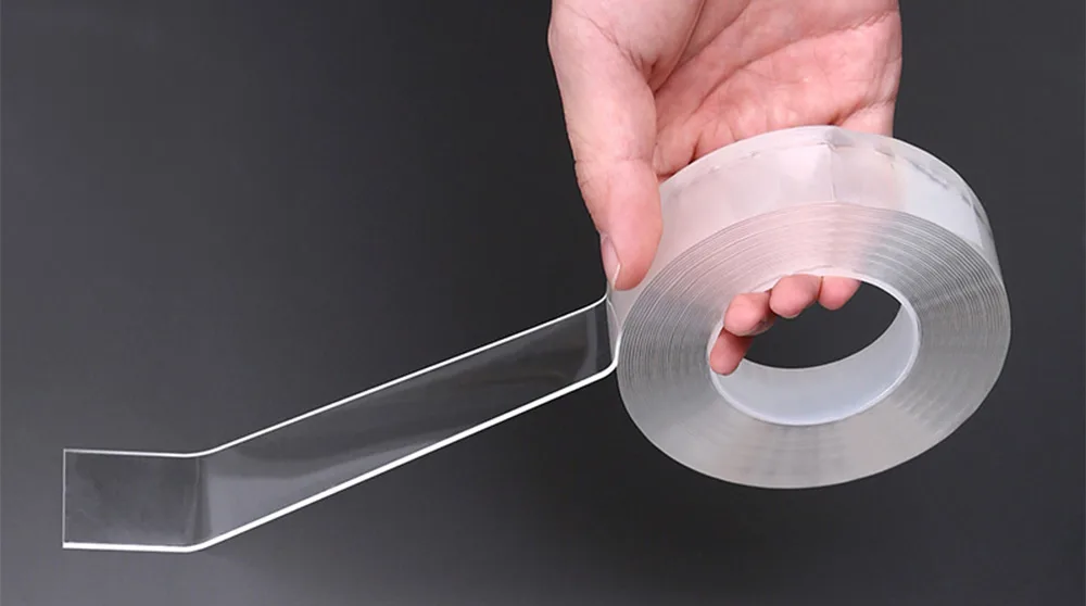 applying a nano double sided tape, showcasing its transparency