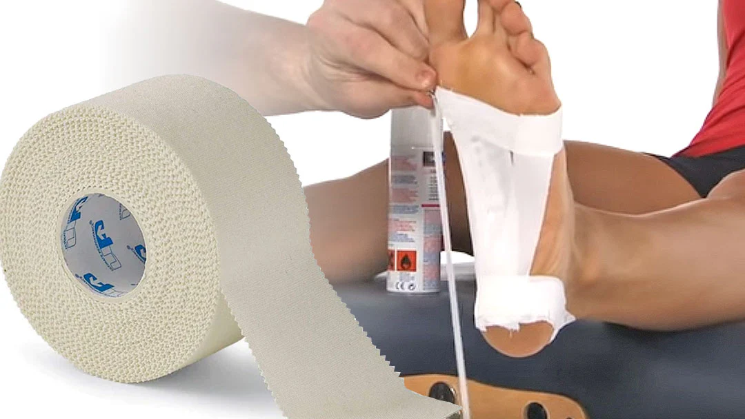 applying zinc oxide tape under the foot