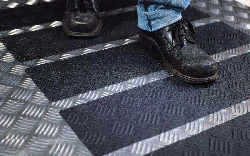 black anti-slip tape applied on the pavement